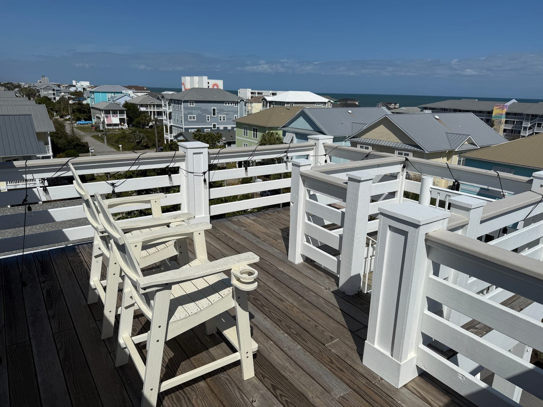 Original rooftop deck photo before real estate photo enhancement